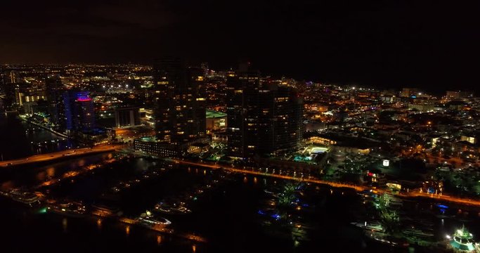 Aerial night drone video Miami Beach Marina and architecture 4k