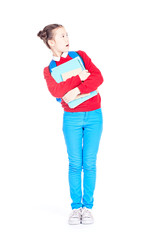 Portrait of female student holding notebooks and textbooks on white background