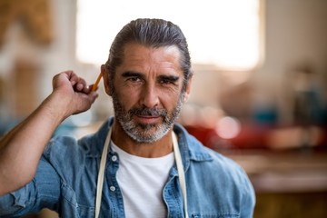 Portrait of confident carpenter