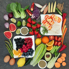 Diet super food concept with high protein meat and seafood, vegetables, fruit, dairy and herbal medicine of gymnema sylvestre and tribulus terrestris herbs used as an appetite suppressant. 