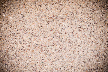 Black to brown granite texture. Abstract stone wall.