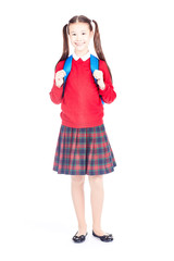 Asian female elementary student in school uniform posing on white background
