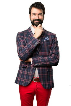 Well dressed man thinking on white background