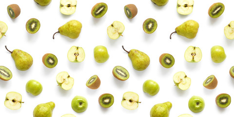 Seamless pattern of fresh fruits. Pears, apples, slices of kiwi isolated on white background, top view, flat layout. Food texture. The concept of healthy eating.