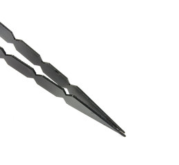 coal tonges isolated on the white