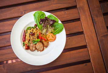 Spaghetti with Thai spicy sausage.