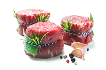 Gardinen Raw beef fillet steaks mignon isolated on white background © Alexander Raths