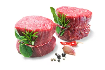 Poster Raw beef fillet steaks mignon isolated on white background © Alexander Raths