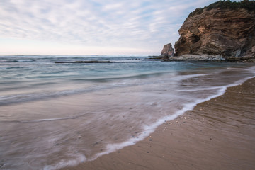Fototapeta na wymiar beautiful sandy beach on atlantic coastline in sunset, hendaye, basque country, france