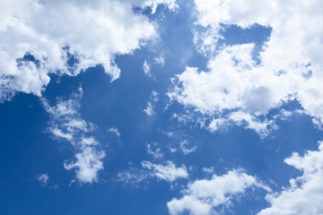 white clouds in the blue sky