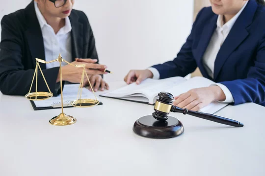 Teamwork of business lawyer colleagues, consultation and conference of  professional female lawyers working having at law firm in office. Concepts  of law, Judge gavel with scales of justice Stock Photo | Adobe