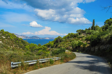 Fototapeta na wymiar Local road trough the hills of Zakynthos island, Greece