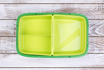 Empty lunch box on wooden table, top view © photka