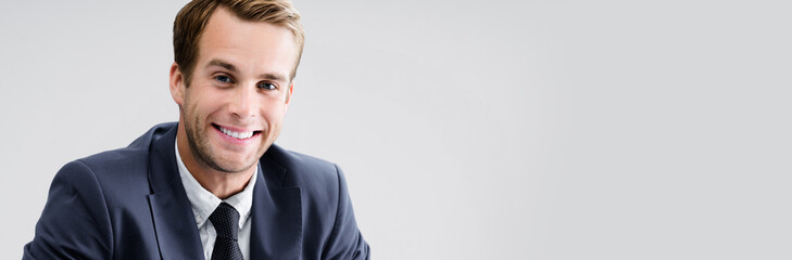 Portrait of young businessman, with copyspace