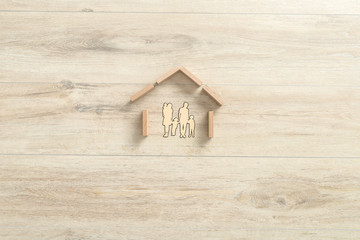 Obraz na płótnie Canvas Residential house made of building wooden blocks for a family