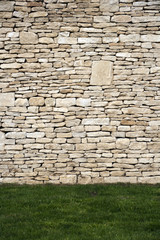 Brand new cotswold drystone wall and lawn