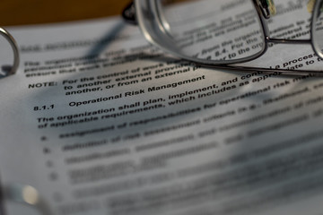 Macro Image of Operational Risk Management (ORM) focus with Eye Glasses
