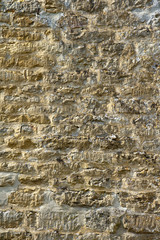 Old lichen covered  limestone wall background texture