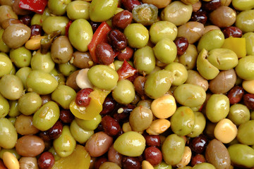Full frame close up of mixed olives displayed on a market stall in the Dordogne, France