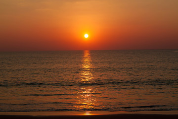 Naklejka na ściany i meble Colorful Sunset on the beach 
