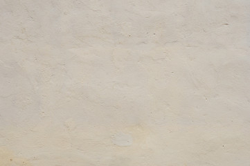 Texture Beige dyed cemented wall, softly lined. Exterior texture exterior wall of external walls