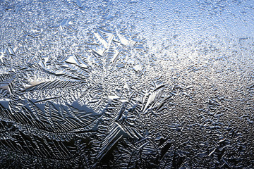 winter pattern of ice crystals on glass