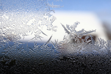 winter pattern of ice crystals on glass