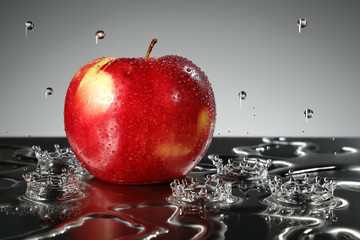 Red apple with water drop