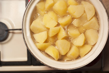 Potatoes are cooked in a pot of mashed potatoes