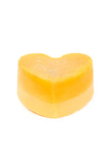 Handmade soap in the form of heart isolated white background.