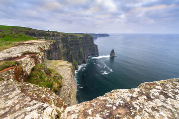 Cliffs of Moher in Ireland at cloudy day, Co. Clare
