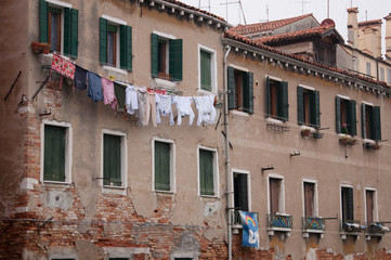 Fototapeta na wymiar Building with clothes drying