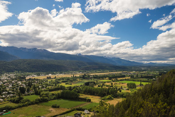Fototapeta premium The green valley of El Bolson in argentinian Patagonia. The Andes and the forest