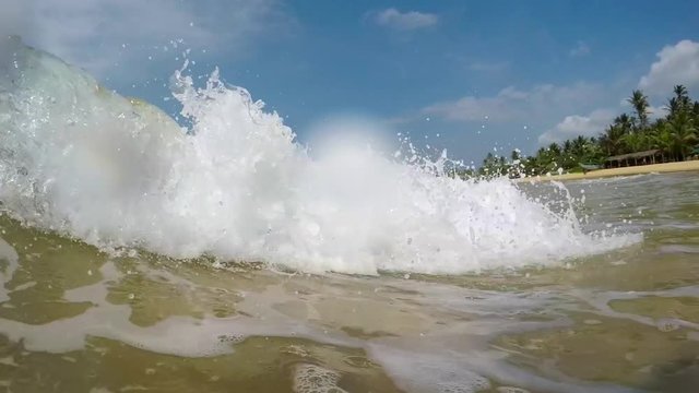 Tropical Ocean Wave Crashes over Camera in Hikkaduwa, Sri Lanka