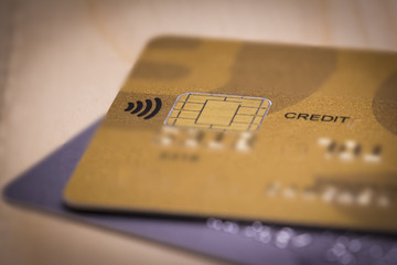 Macro view of contactless icon on a credit card. Electronic payment and business concept.