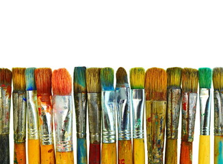 Various dirty paint brushes. Artistic brushes isolated on white background.