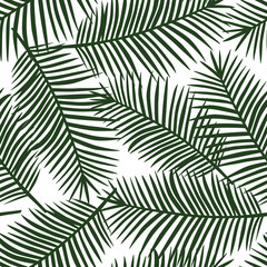 green palm leaves on a white background exotic tropical hawaii seamless pattern vector