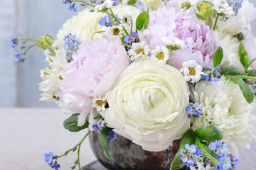 Floral arrangement with pink peonies