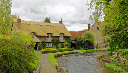 Fototapeta na wymiar Thatched roof house in North Yorkshire, England