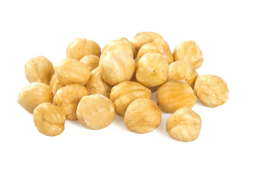 roasted hazelnuts isolated on white