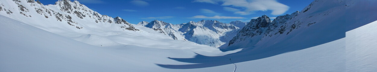 Fototapeta na wymiar skitouring in beautiful snowy alps