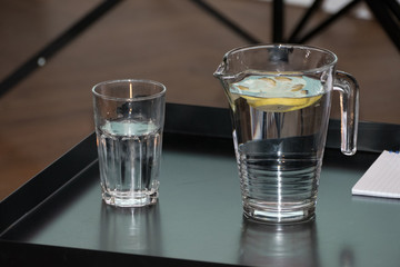 refreshing water with lemon on a table