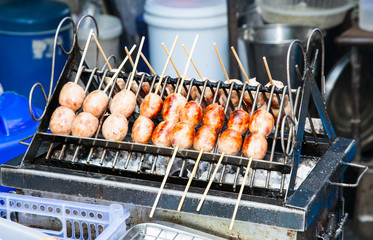 Grilled Thai sausages on the steet of Bangkok