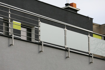 Railing with Rococo shapes in a new stainless steel style 