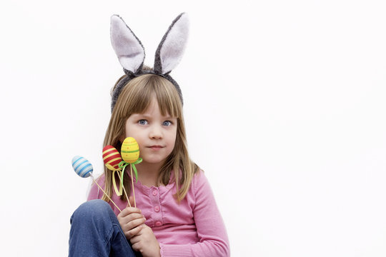 Girl wearing bunny ears