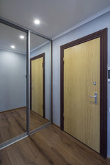 Entrance with steel door in the flat.