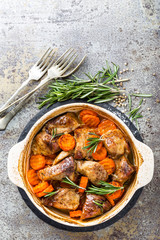 Meat baked with carrots in the oven