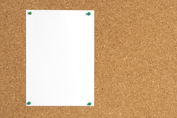 Cork board with blank paper for your notice