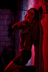 Girl posing in an abandoned building