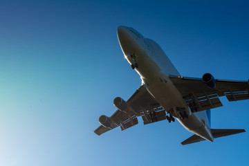 Horizontal View of Close Up of a Cargo Airplane in the Landing Operation in The Morning. Grottaglie, Taranto, South of Italy